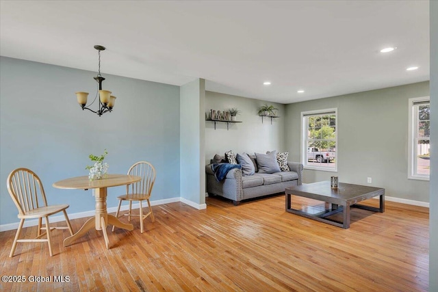 34 Wilson Ave, South Glens Falls, NY 12803 - living area with light wood-style flooring, a chandelier, and recessed lighting