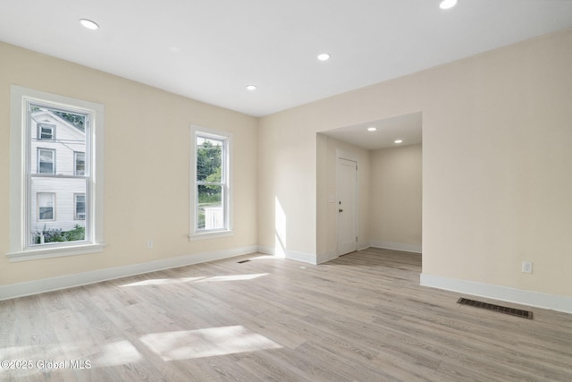 21 Kimball St, Amsterdam, NY 12010 - empty room featuring light wood-type flooring, baseboards, and recessed lighting