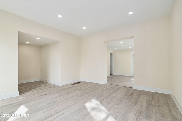 21 Kimball St, Amsterdam, NY 12010 - spare room featuring wood finished floors, recessed lighting, and baseboards