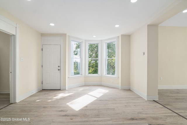21 Kimball St, Amsterdam, NY 12010 - foyer entrance with baseboards, light wood-style floors, and recessed lighting