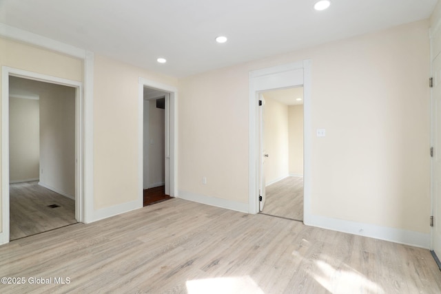 21 Kimball St, Amsterdam, NY 12010 - unfurnished bedroom featuring light wood finished floors, recessed lighting, and baseboards