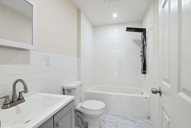 21 Kimball St, Amsterdam, NY 12010 - bathroom with toilet, marble look tiles, vanity, tile walls, and shower / washtub combination