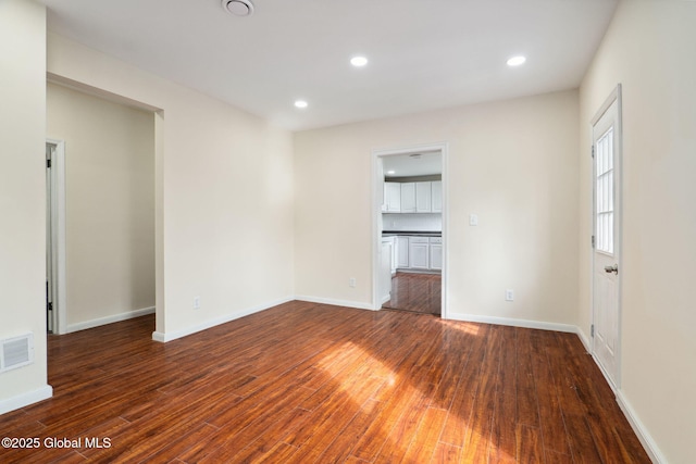 21 Kimball St, Amsterdam, NY 12010 - unfurnished room with wood finished floors, recessed lighting, and baseboards