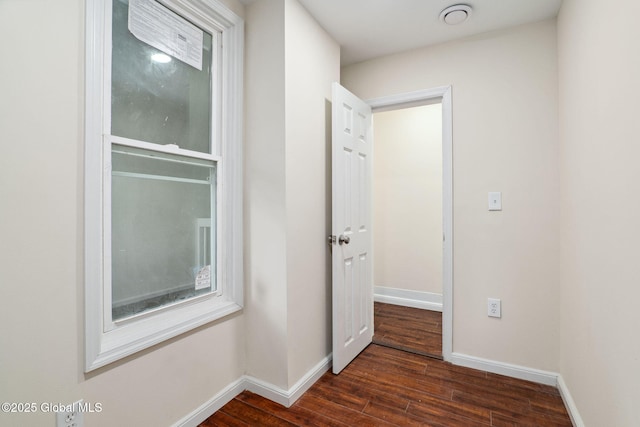 21 Kimball St, Amsterdam, NY 12010 - hallway featuring dark wood finished floors and baseboards