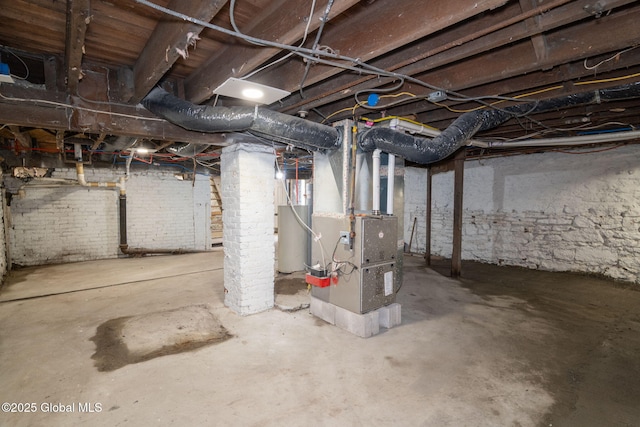 21 Kimball St, Amsterdam, NY 12010 - unfinished basement with heating unit and water heater