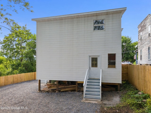 21 Kimball St, Amsterdam, NY 12010 - back of property with entry steps and a fenced backyard