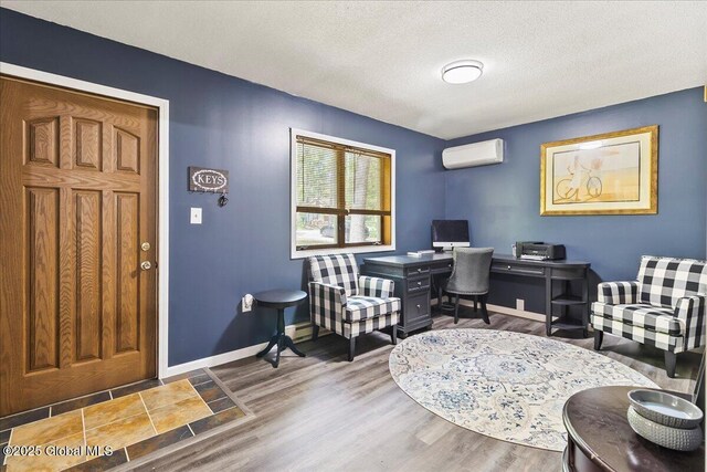 140 Redmond Rd, Moreau, NY 12831 - office with a wall mounted AC, wood finished floors, baseboards, and a textured ceiling