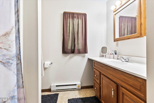 140 Redmond Rd, Moreau, NY 12831 - bathroom featuring a baseboard radiator, vanity, and baseboards