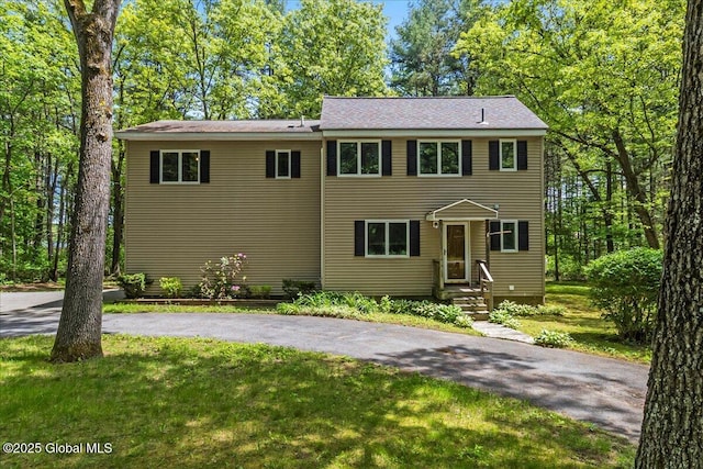 140 Redmond Rd, Moreau, NY 12831 - view of front of home featuring a front lawn and asphalt driveway