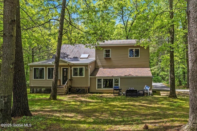 140 Redmond Rd, Moreau, NY 12831 - back of house with a lawn and entry steps