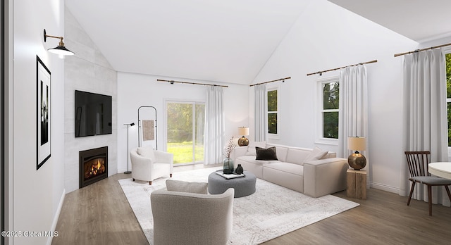 5 Seville Way, Bethlehem, NY 12158 - living room with high vaulted ceiling, a tiled fireplace, wood finished floors, and baseboards