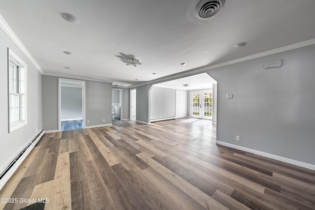 7116 Fuller Station Rd, Schenectady, NY 12303 - unfurnished living room featuring baseboard heating, crown molding, wood finished floors, arched walkways, and a baseboard radiator