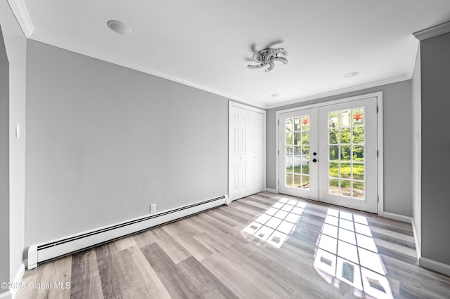 7116 Fuller Station Rd, Schenectady, NY 12303 - empty room with a baseboard heating unit, ornamental molding, french doors, baseboards, and wood finished floors