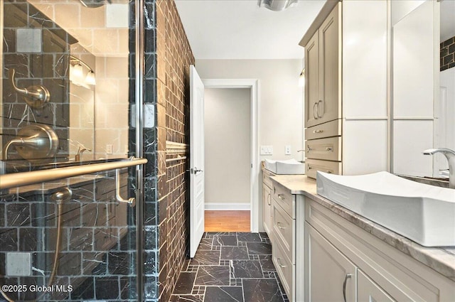 2085 Weast Rd, Princetown, NY 12137 - full bath featuring marble finish flooring, vanity, a tile shower, and baseboards