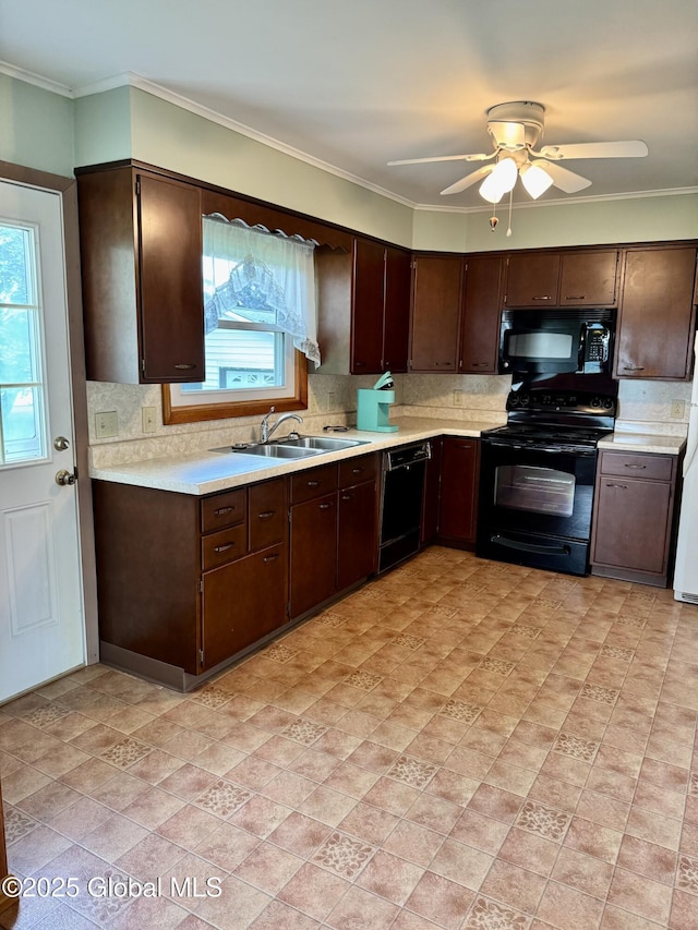 210 County Route 44, Argyle, NY 12809 - kitchen with black appliances, light countertops, dark brown cabinets, decorative backsplash, and ornamental molding
