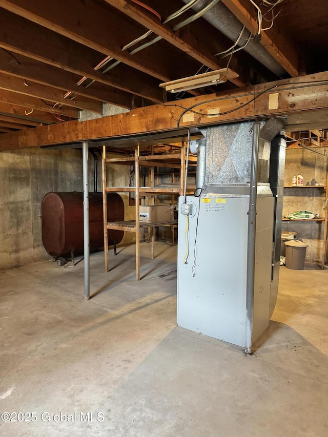 210 County Route 44, Argyle, NY 12809 - unfinished below grade area with oil tank and heating unit