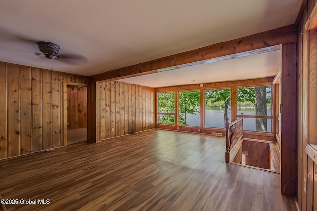 241 Kunkel Rd, Mayfield, NY 12117 - unfurnished room with wood walls, wood finished floors, healthy amount of natural light, a water view, and a ceiling fan
