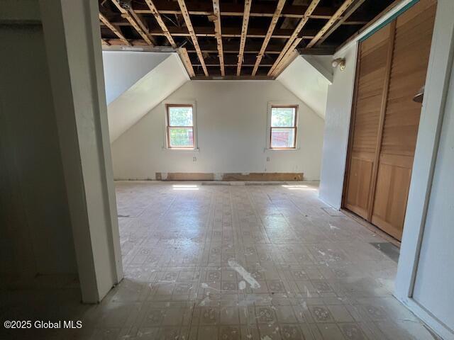854 Millers Corners Rd, Florida, NY 12053 - additional living space featuring vaulted ceiling and tile patterned floors