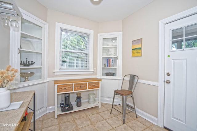 5 Kakely St, Albany, NY 12208 - living area with light tile patterned flooring and baseboards