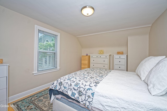 5 Kakely St, Albany, NY 12208 - bedroom featuring vaulted ceiling and wood finished floors