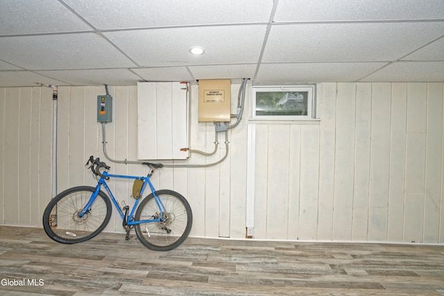5 Kakely St, Albany, NY 12208 - finished basement with a paneled ceiling, wood finished floors, and wooden walls