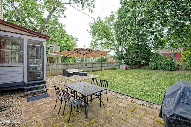 5 Kakely St, Albany, NY 12208 - fenced backyard with an outdoor hangout area, a patio area, a grill, outdoor dining area, and entry steps