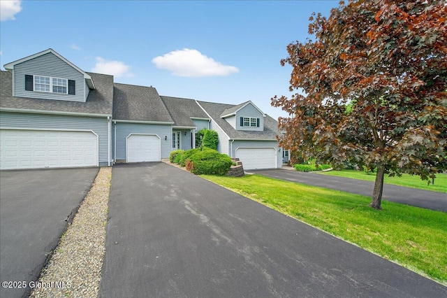 21 Fairway Dr Unit B, Mechanicville, NY 12118 - view of front of house featuring a garage, driveway, a front yard, and roof with shingles