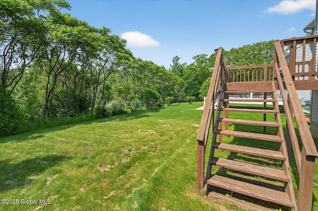 21 Fairway Dr Unit B, Mechanicville, NY 12118 - view of green lawn featuring stairway and a wooden deck