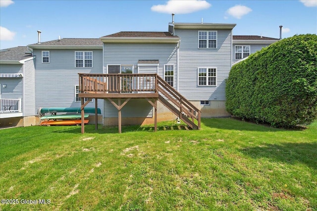 21 Fairway Dr Unit B, Mechanicville, NY 12118 - rear view of house with stairway, a wooden deck, and a lawn