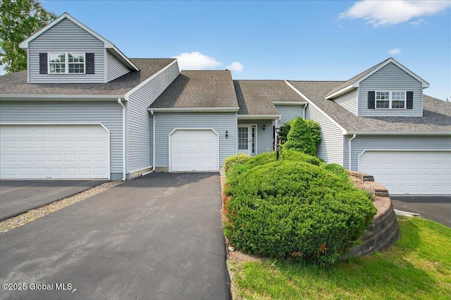 21 Fairway Dr Unit B, Mechanicville, NY 12118 - view of front facade with asphalt driveway, roof with shingles, and an attached garage