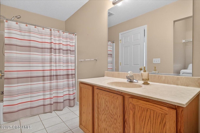 21 Fairway Dr Unit B, Mechanicville, NY 12118 - bathroom with vanity, tile patterned flooring, toilet, a shower with curtain, and a textured ceiling