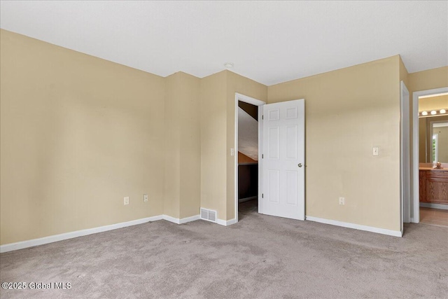 21 Fairway Dr Unit B, Mechanicville, NY 12118 - unfurnished bedroom featuring carpet, baseboards, and connected bathroom
