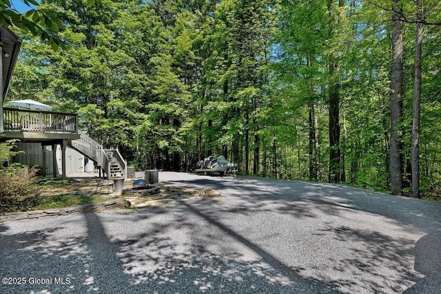 209 Chester Shores Rdg, Chester, NY 12817 - view of asphalt driveway featuring stairway and a wooded view