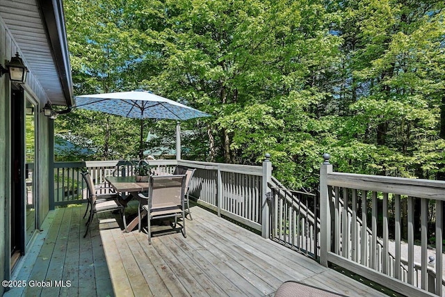 209 Chester Shores Rdg, Chester, NY 12817 - deck featuring outdoor dining area and view of scattered trees