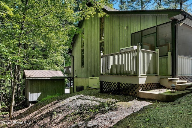 209 Chester Shores Rdg, Chester, NY 12817 - view of side of property featuring central air condition unit, an outbuilding, and a wooden deck