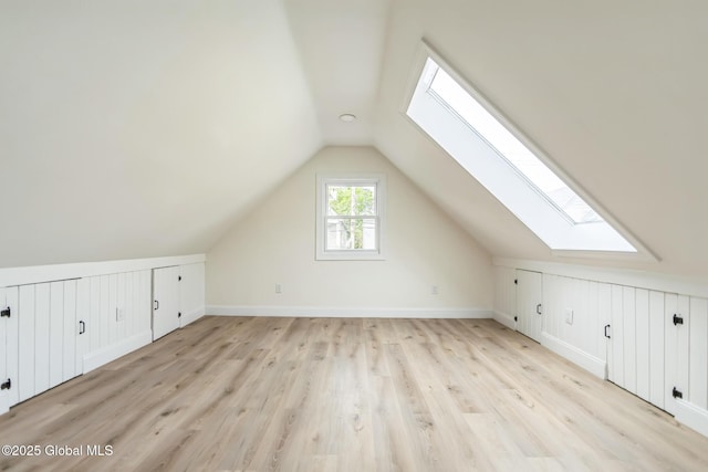 747 Eastern Ave, Schenectady, NY 12308 - bonus room featuring a skylight, vaulted ceiling, light wood finished floors, and baseboards