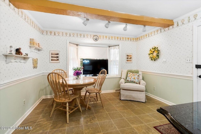 42 Pheasant Ridge Dr, Colonie, NY 12211 - dining space featuring rail lighting, crown molding, wallpapered walls, and a wainscoted wall