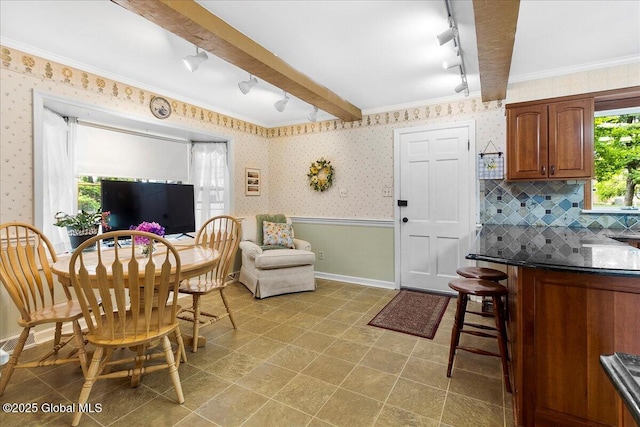 42 Pheasant Ridge Dr, Colonie, NY 12211 - dining space with rail lighting, wallpapered walls, and baseboards