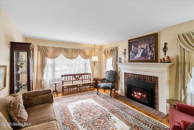42 Pheasant Ridge Dr, Colonie, NY 12211 - living room with a brick fireplace and wood finished floors