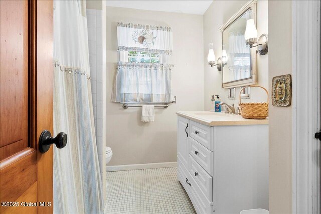 42 Pheasant Ridge Dr, Colonie, NY 12211 - full bathroom featuring toilet, vanity, baseboards, tile patterned flooring, and a shower with curtain