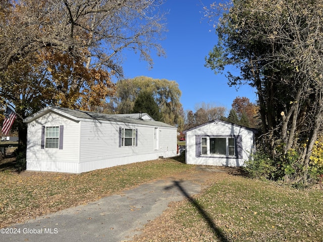66 Plains Rd, Jackson, NY 12816 - view of front of property with a front lawn