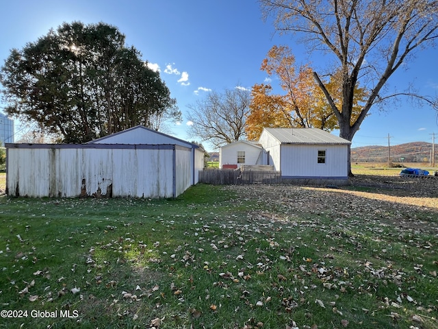 66 Plains Rd, Jackson, NY 12816 - view of yard featuring an outdoor structure and an outbuilding