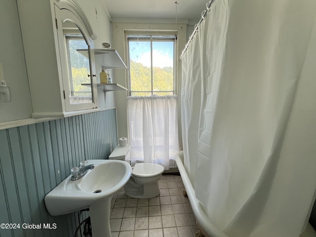 50 W Main St, Cambridge, NY 12816 - bathroom featuring toilet, shower / tub combo with curtain, tile patterned flooring, and a sink