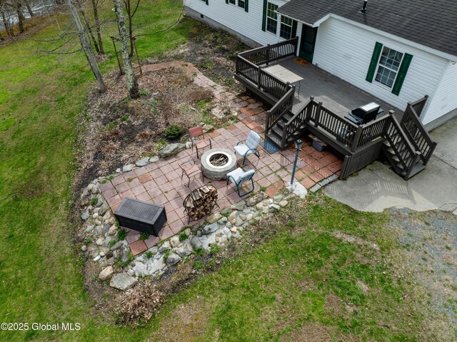 667-669 Ash Grove Rd, White Creek, NY 12816 - view of patio / terrace featuring a fire pit, a deck, and stairs