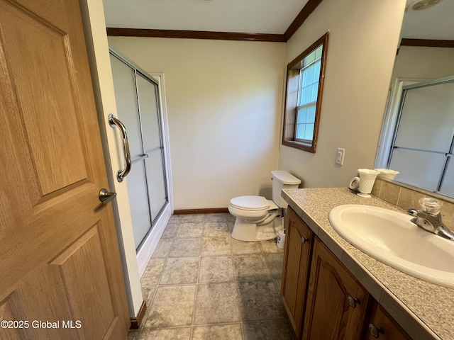 667-669 Ash Grove Rd, White Creek, NY 12816 - bathroom with crown molding, a shower with door, vanity, toilet, and baseboards
