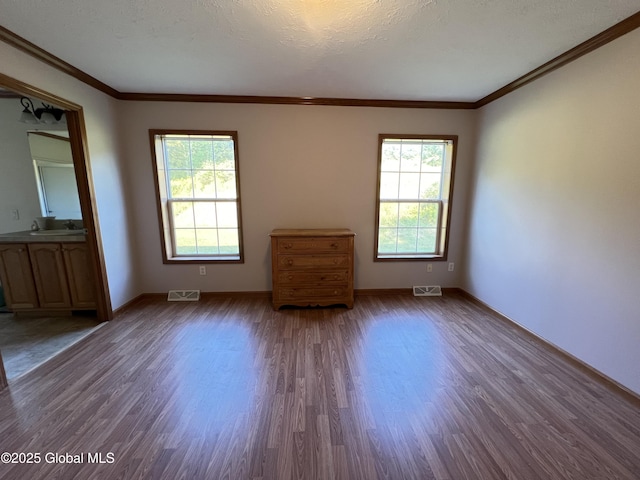 667-669 Ash Grove Rd, White Creek, NY 12816 - spare room with wood finished floors, crown molding, baseboards, and a sink