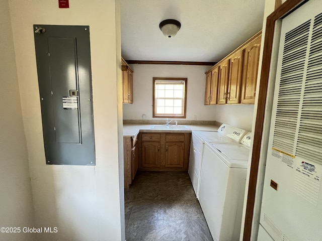 667-669 Ash Grove Rd, White Creek, NY 12816 - laundry room featuring cabinet space, a heating unit, washing machine and dryer, crown molding, and electric panel