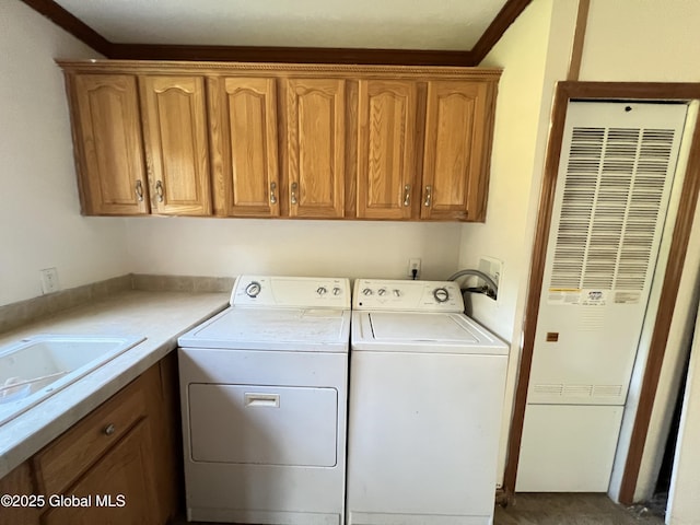 667-669 Ash Grove Rd, White Creek, NY 12816 - laundry room featuring independent washer and dryer, cabinet space, a heating unit, and crown molding