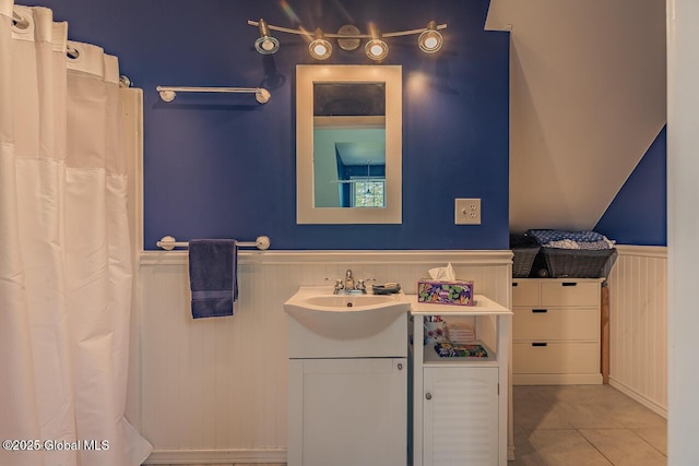 7 Western Ave, Charlton, NY 12019 - full bathroom featuring a wainscoted wall, vanity, tile patterned flooring, and curtained shower