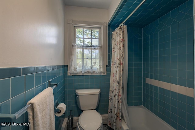 7 Western Ave, Charlton, NY 12019 - bathroom featuring toilet, shower / bath combo, and tile walls